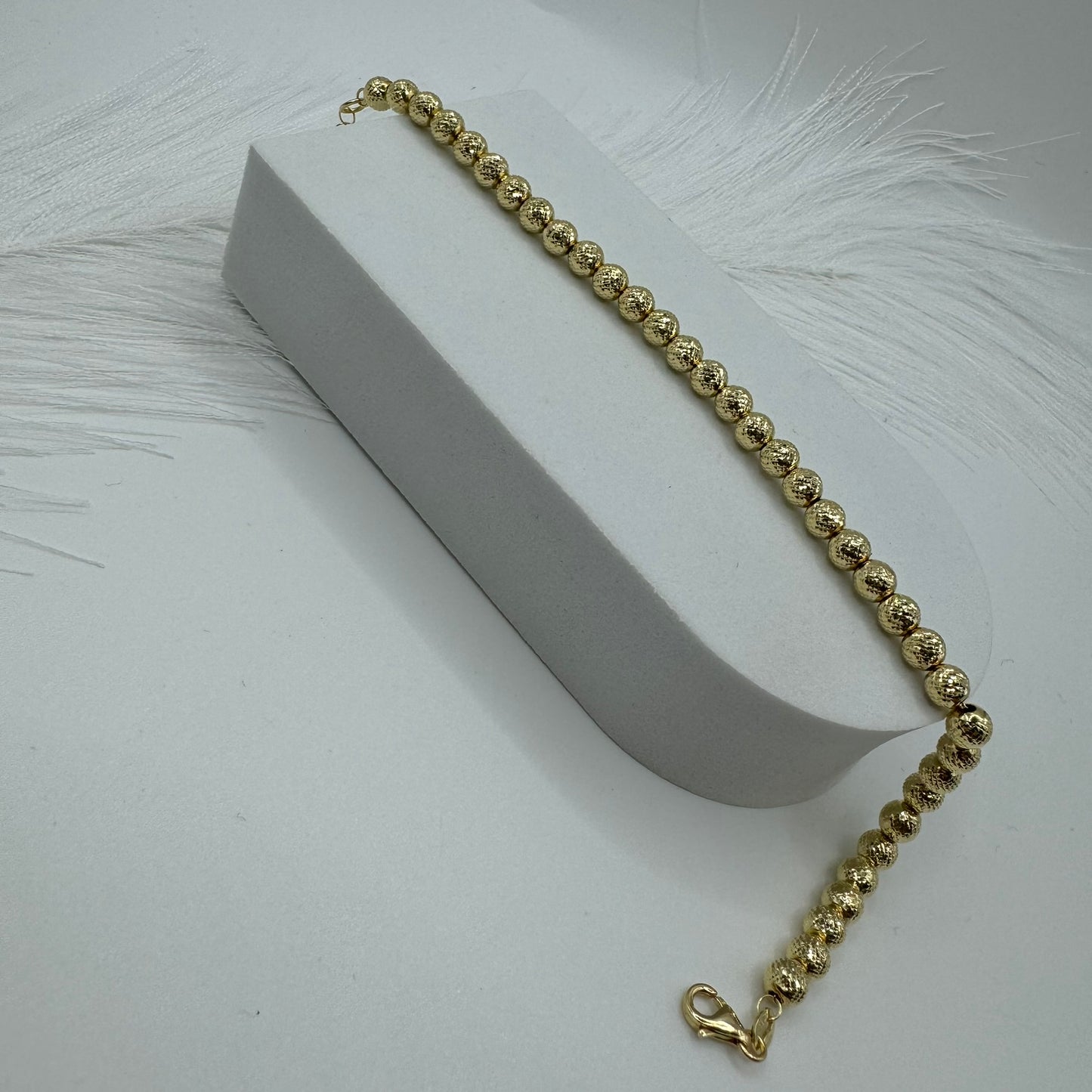 Bracciale sfere milleluci martellate oro