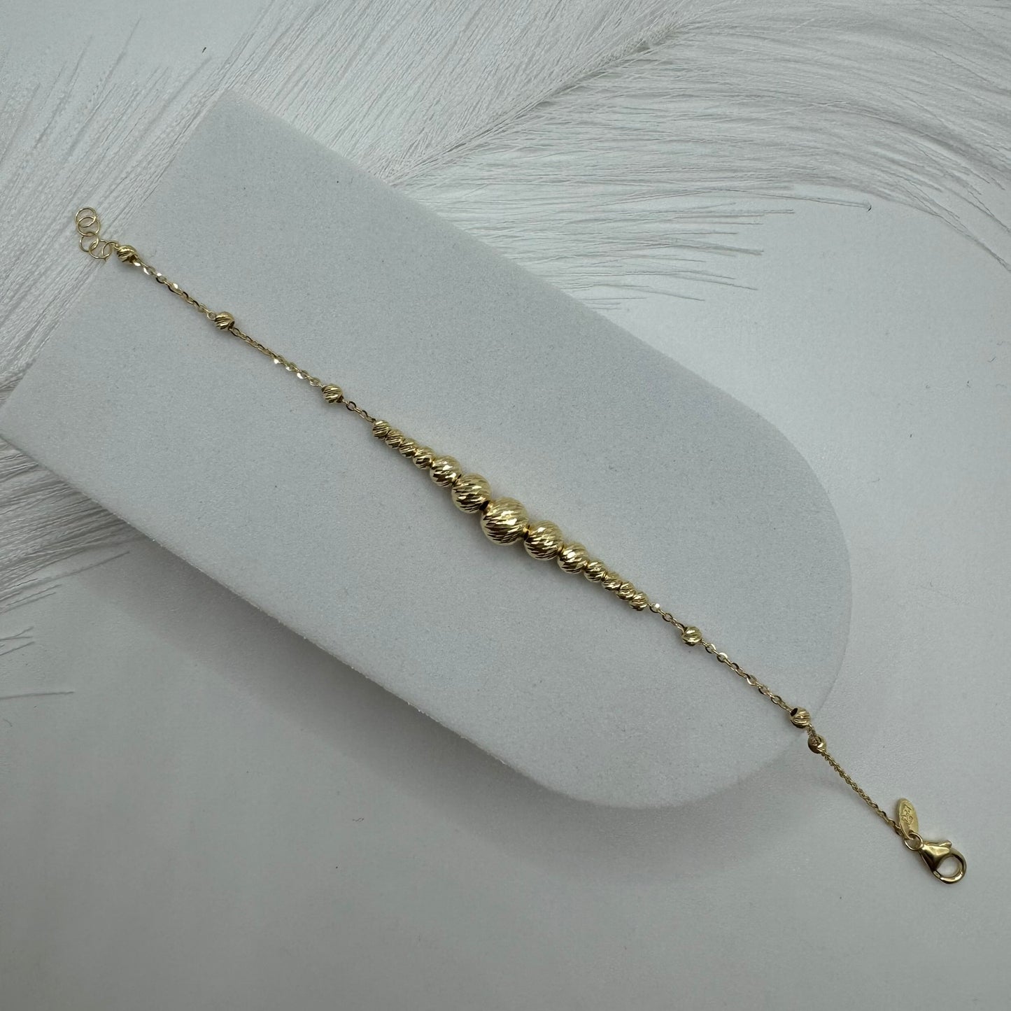 Bracciale rollò con sfere sfaccettate oro