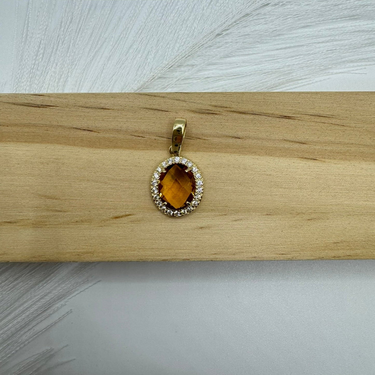 Pendente punto luce ovale oro e zirconi