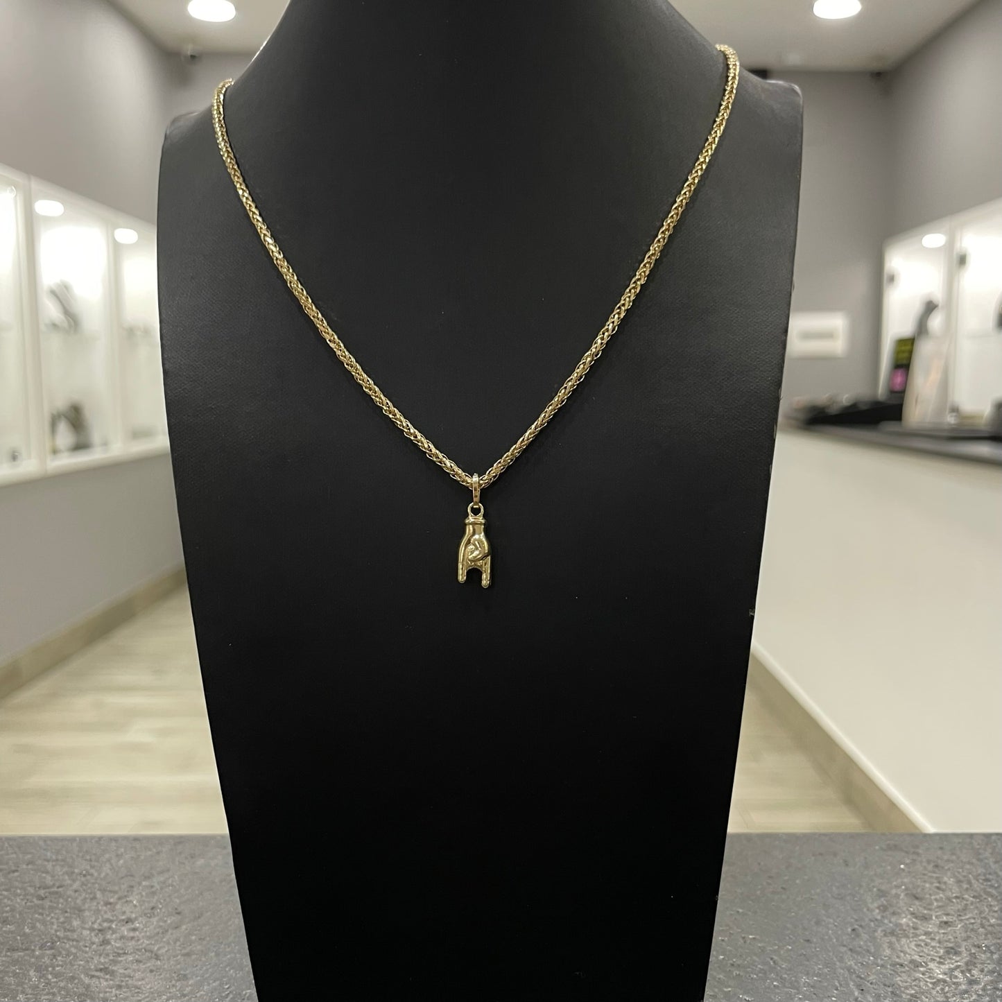 Collana spighetta con corna oro