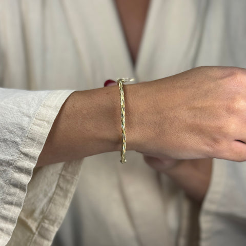 Bracciale rigido martellato oro
