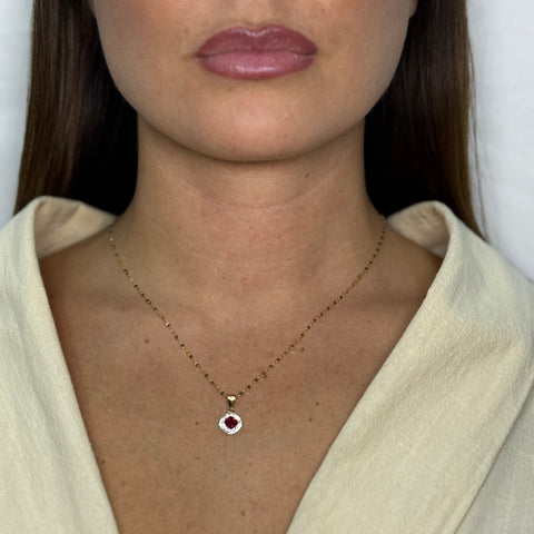 Collana con punto luce rombo con zirconi oro