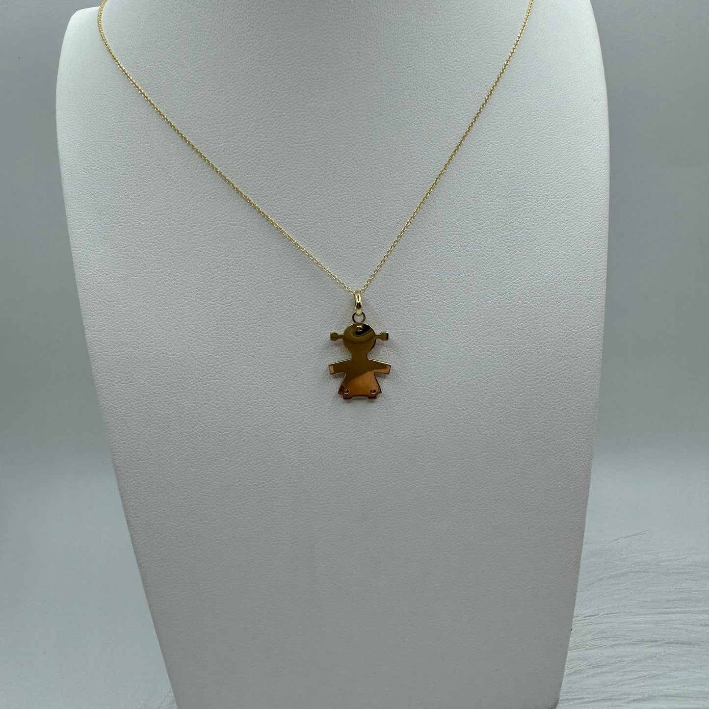 Collana rollò con bimba oro