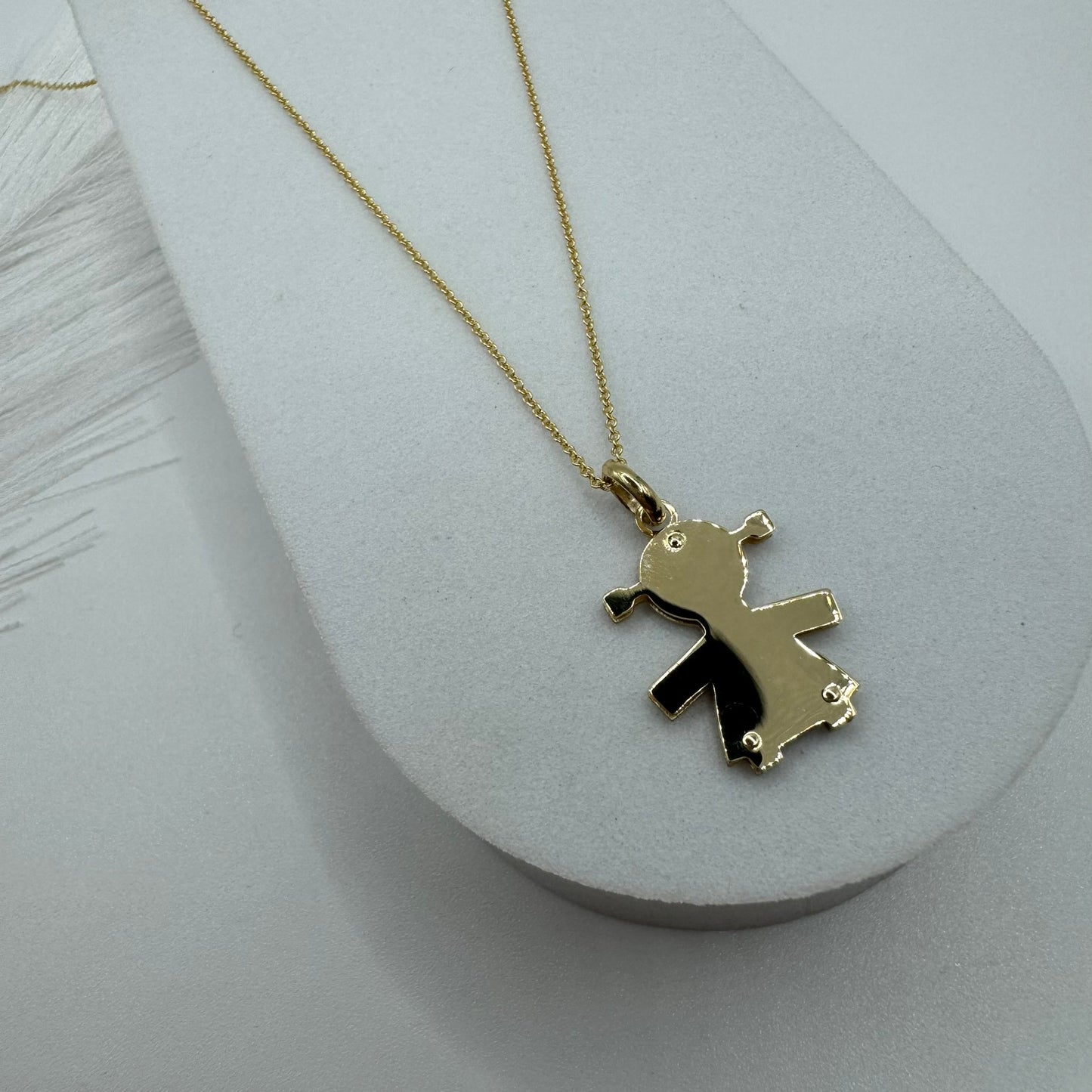 Collana rollò con bimba oro