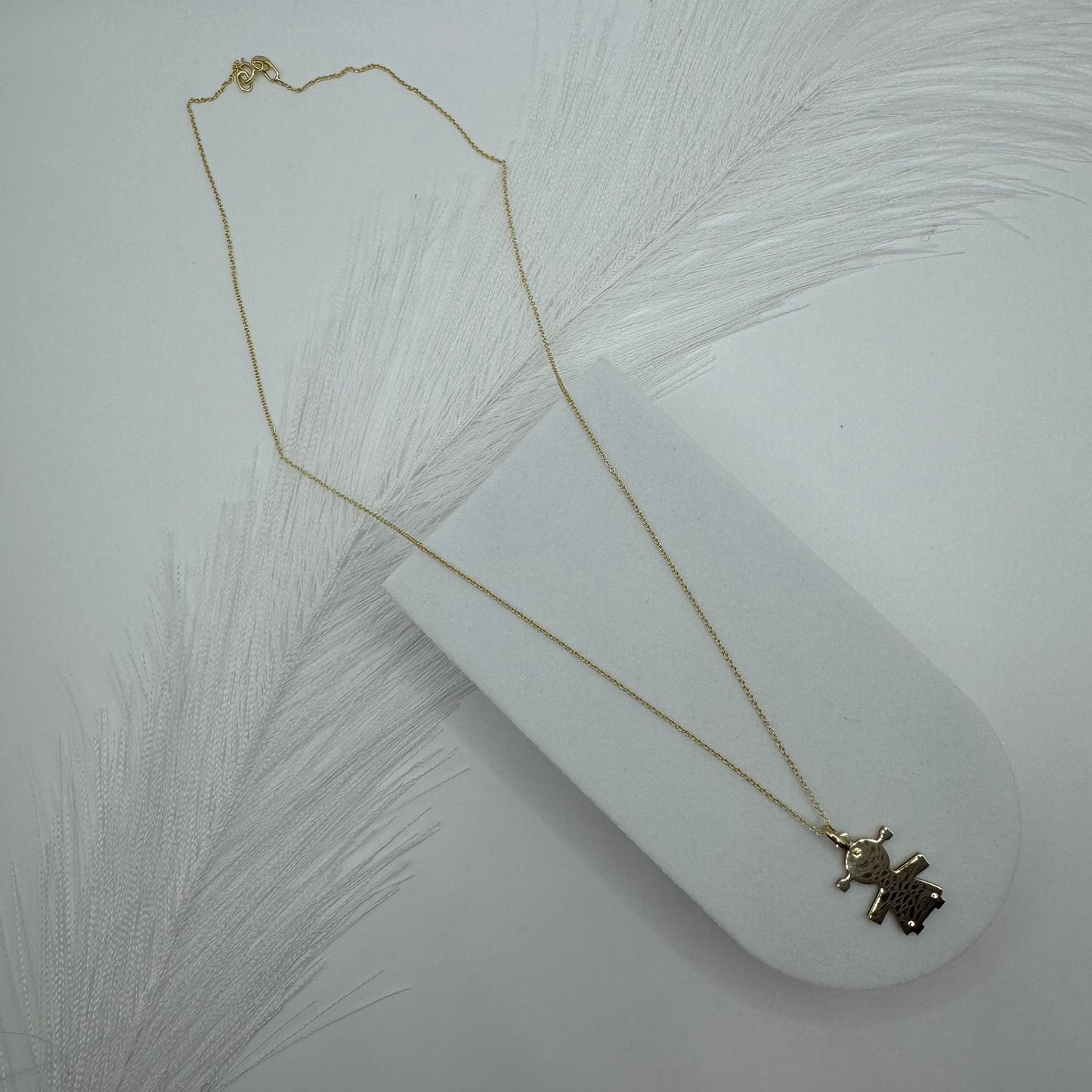 Collana rollò con bimba oro