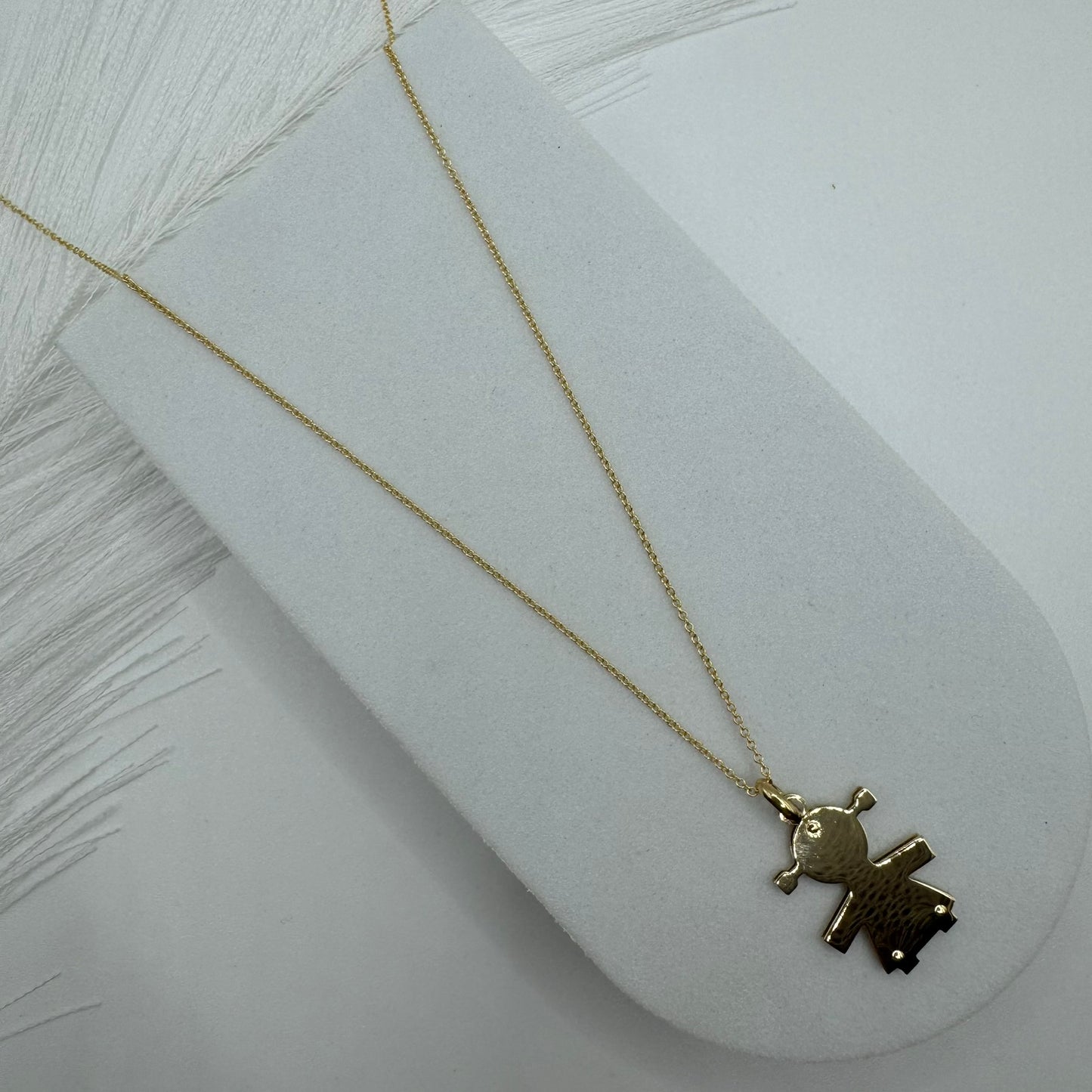 Collana rollò con bimba oro