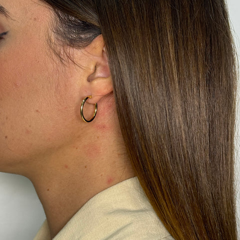Orecchini cerchio tubolare oro