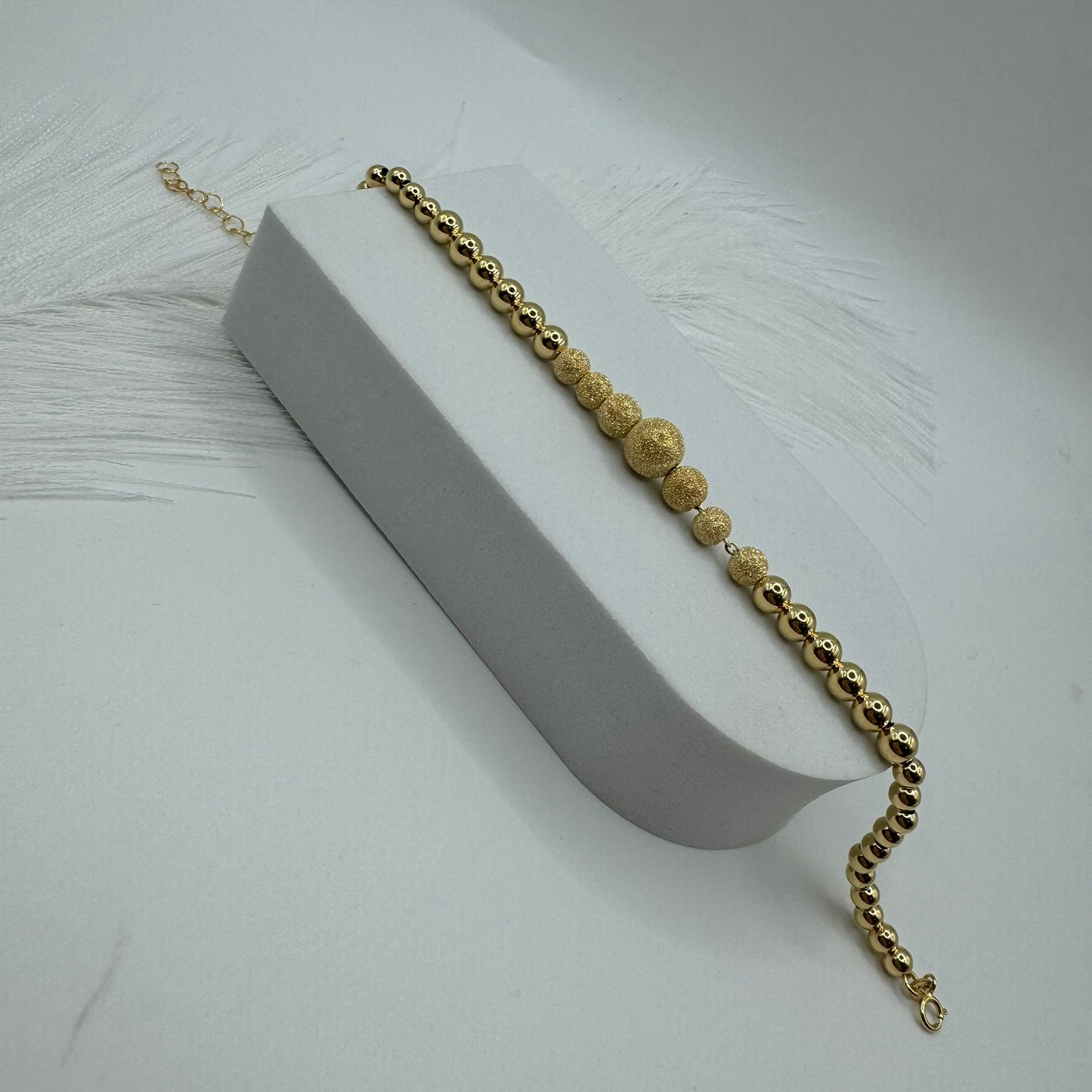 Bracciale sfere degradè oro