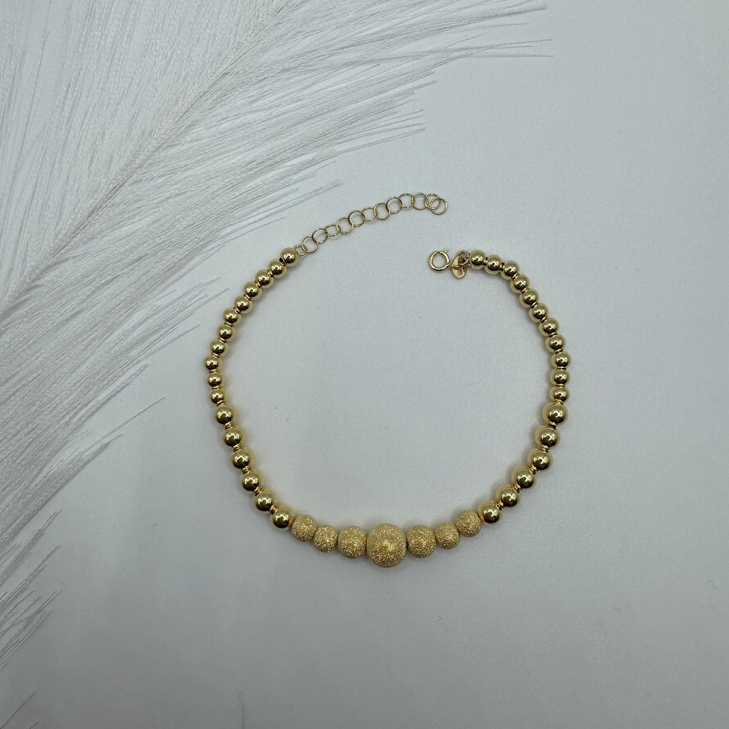 Bracciale sfere degradè oro