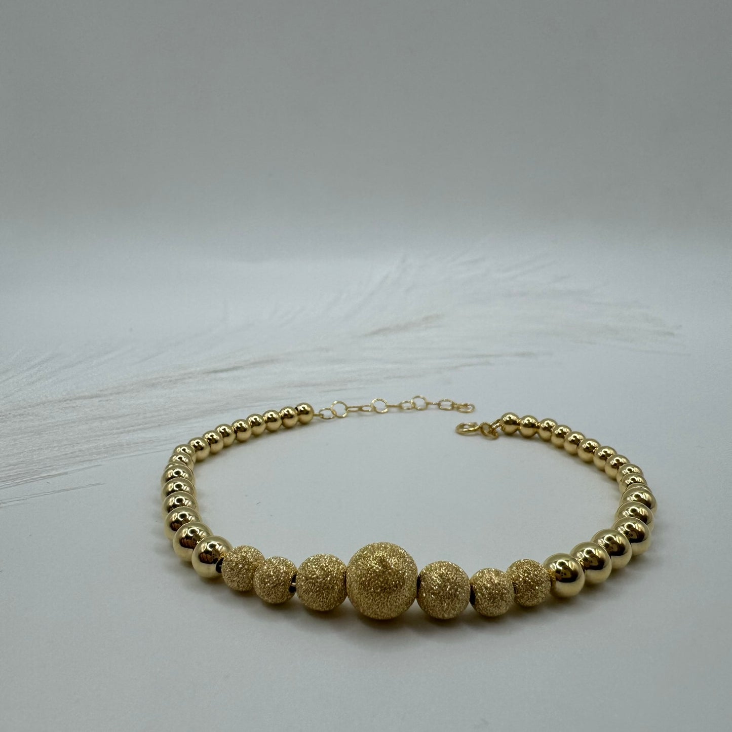 Bracciale sfere degradè oro