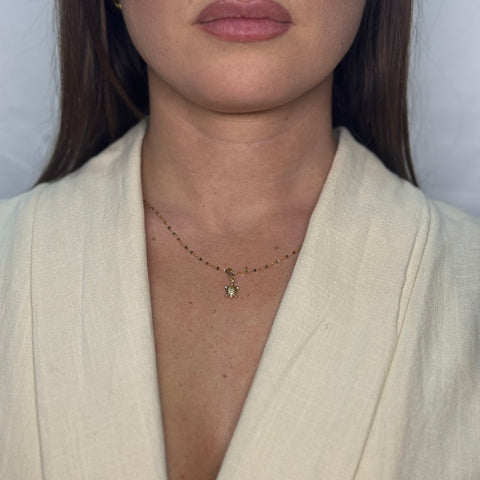 Collana con tartaruga martellata oro