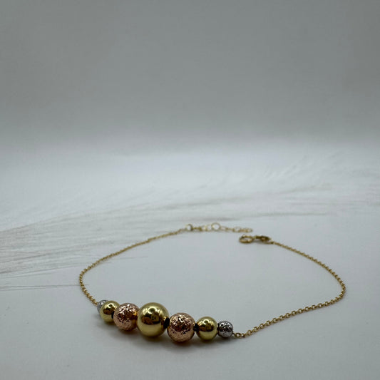 Bracciale rollò con sfere multicolor oro