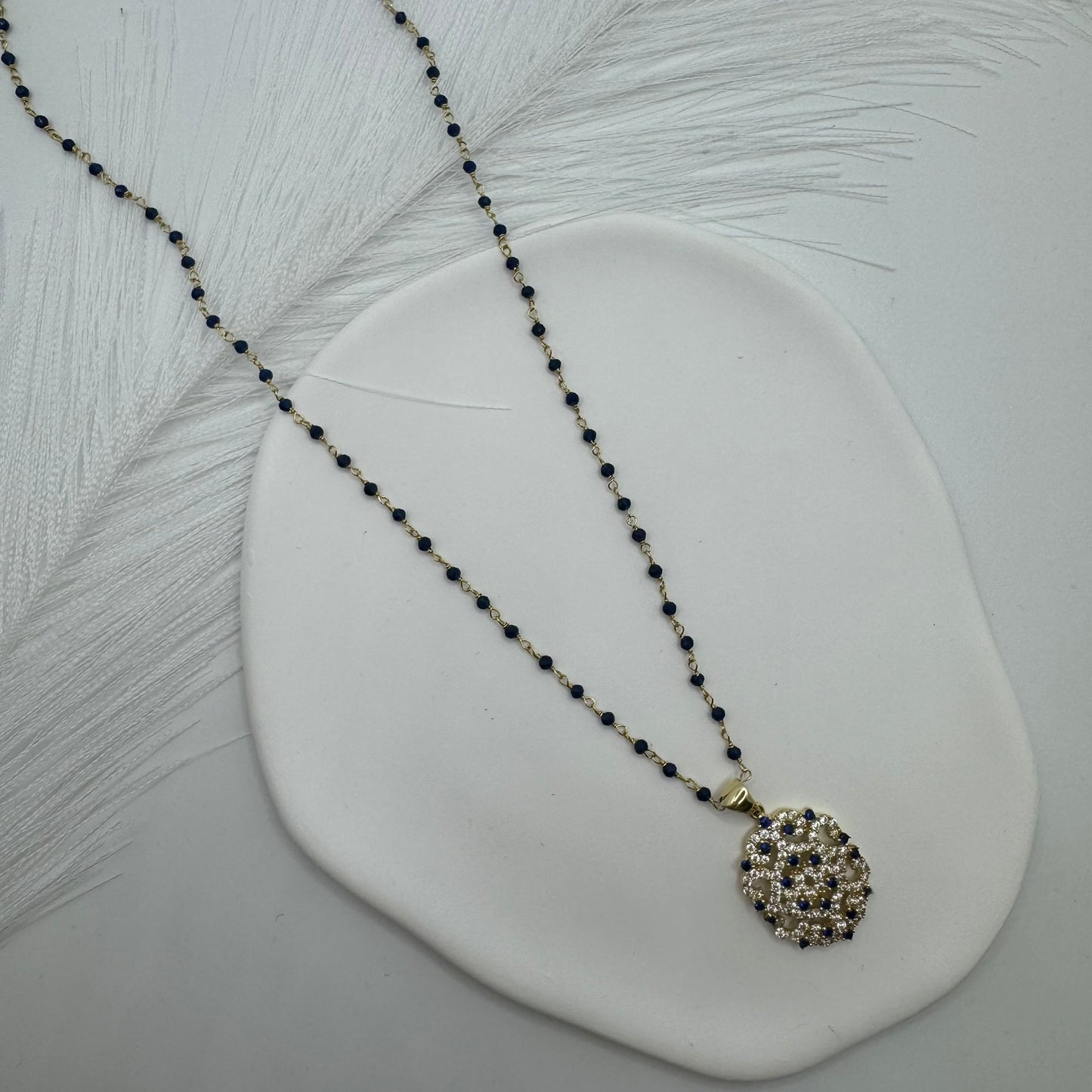 Collana sfere con pendente luminose zirconi e oro