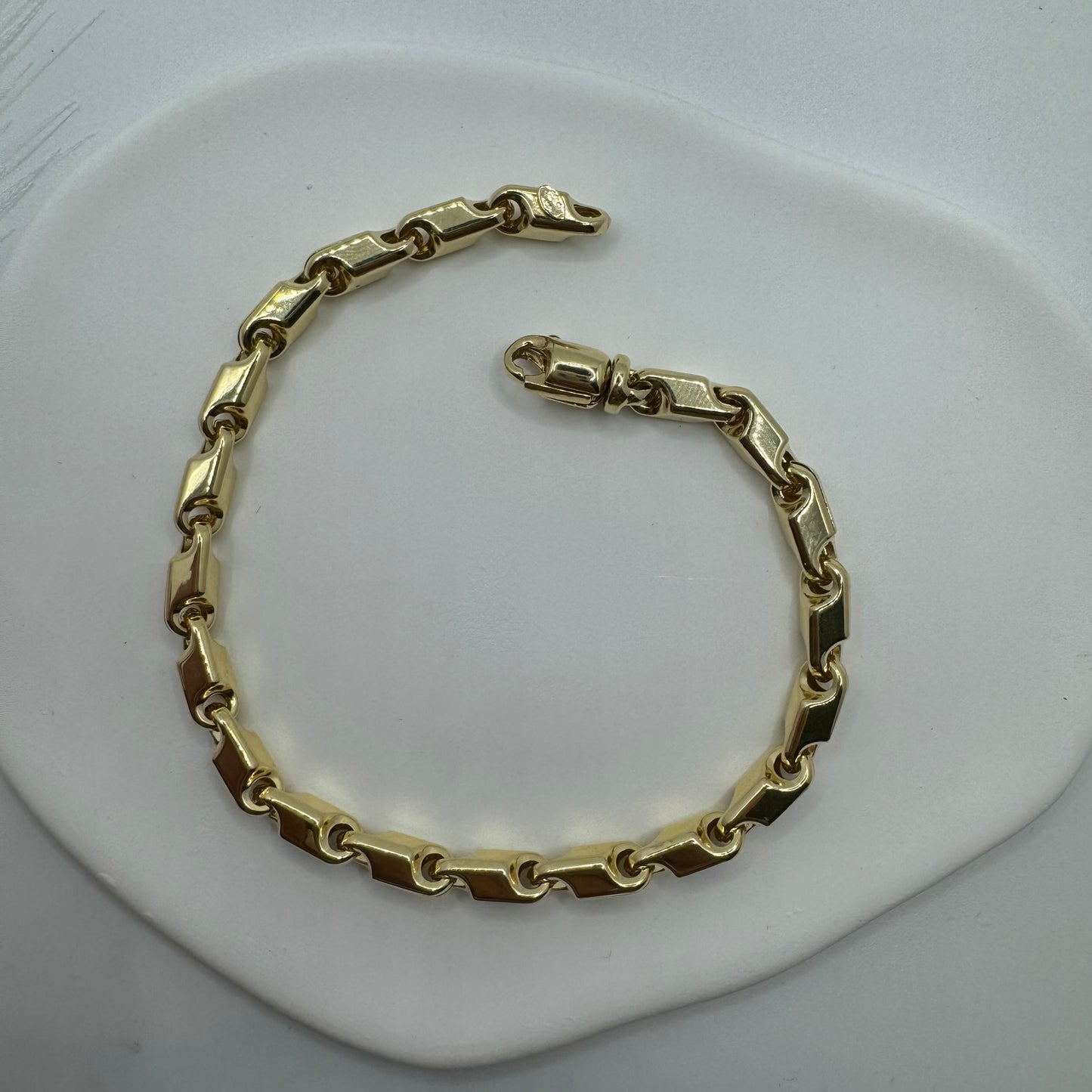 Bracciale tubolare sagomato oro