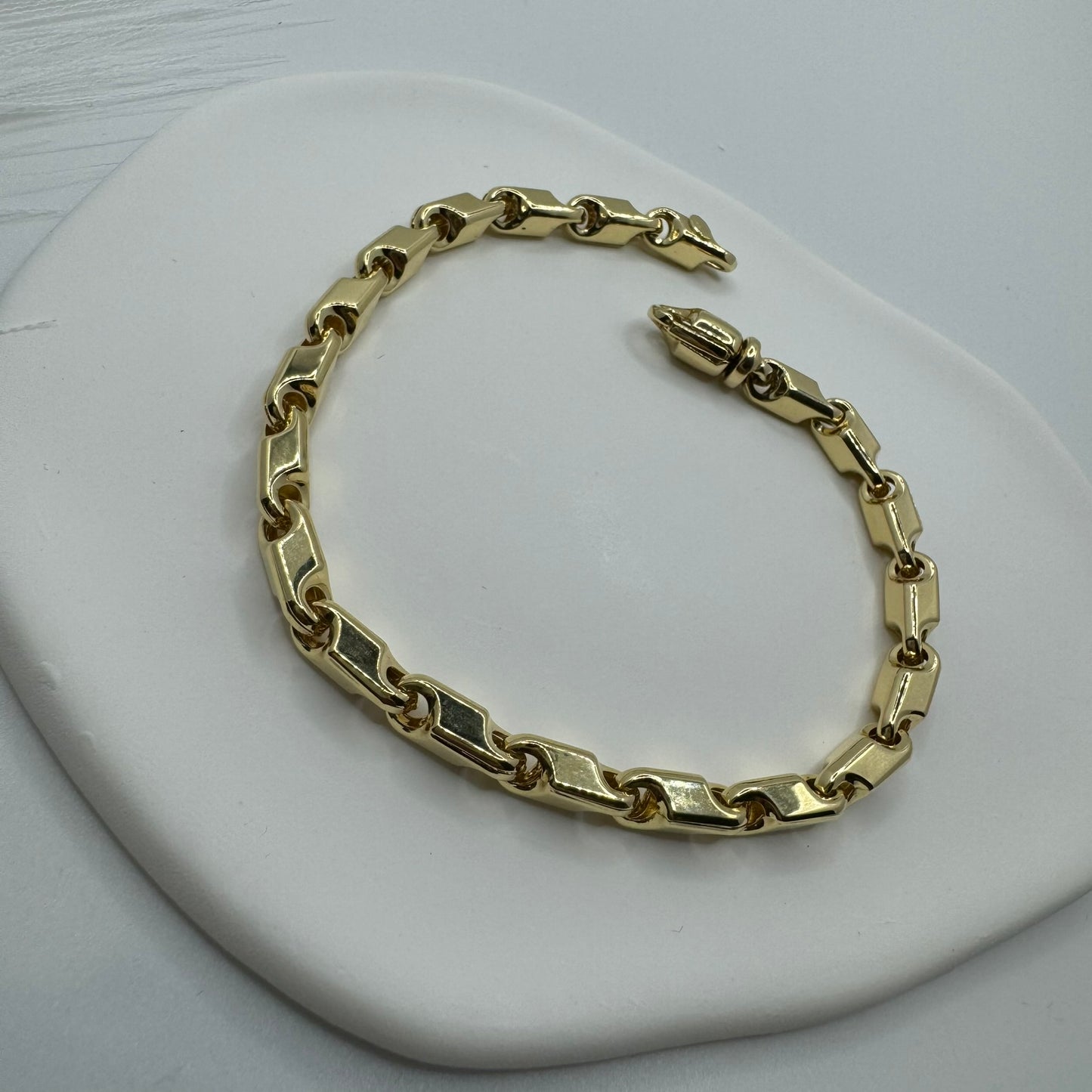 Bracciale tubolare sagomato oro