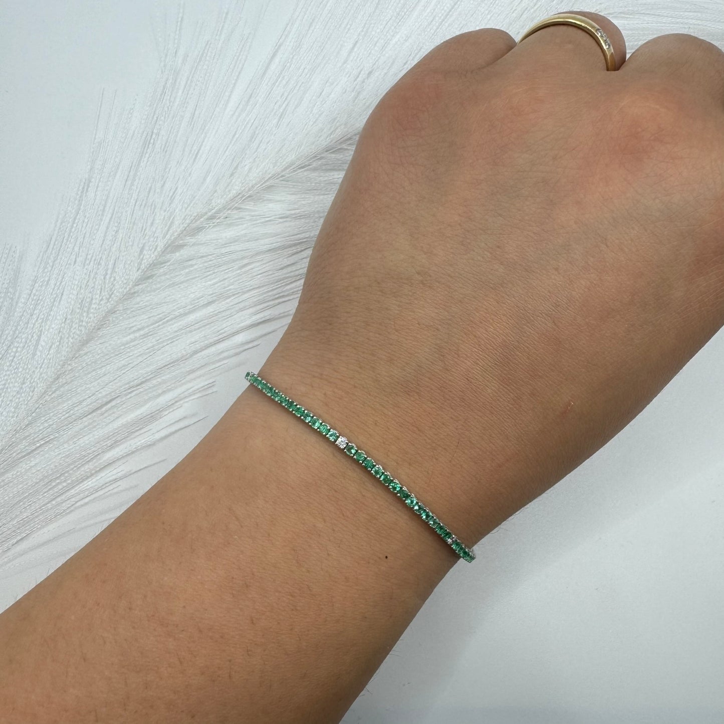 Bracciale tennis smeraldi e diamanti oro