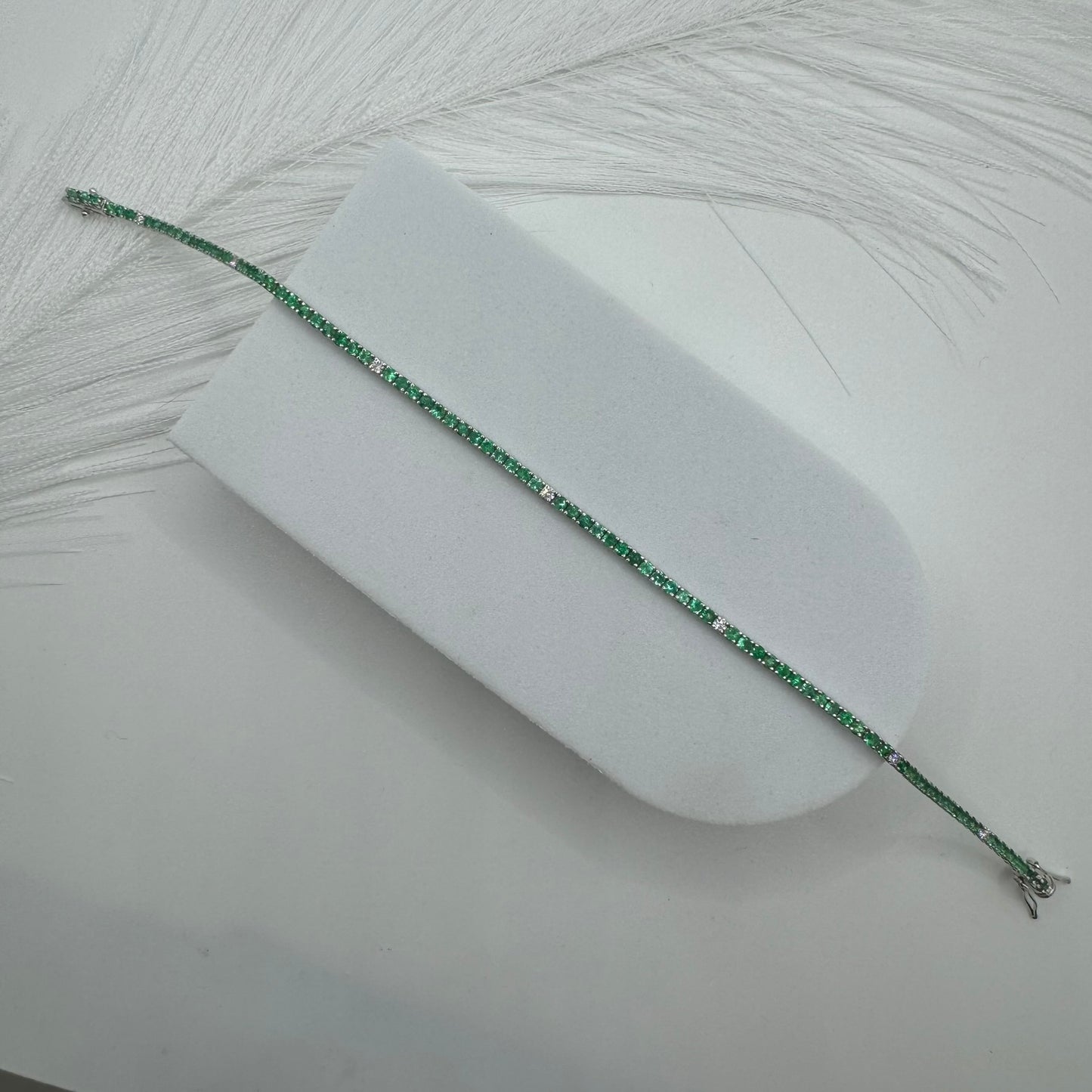 Bracciale tennis smeraldi e diamanti oro