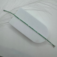 Bracciale tennis oro smeraldi e diamanti