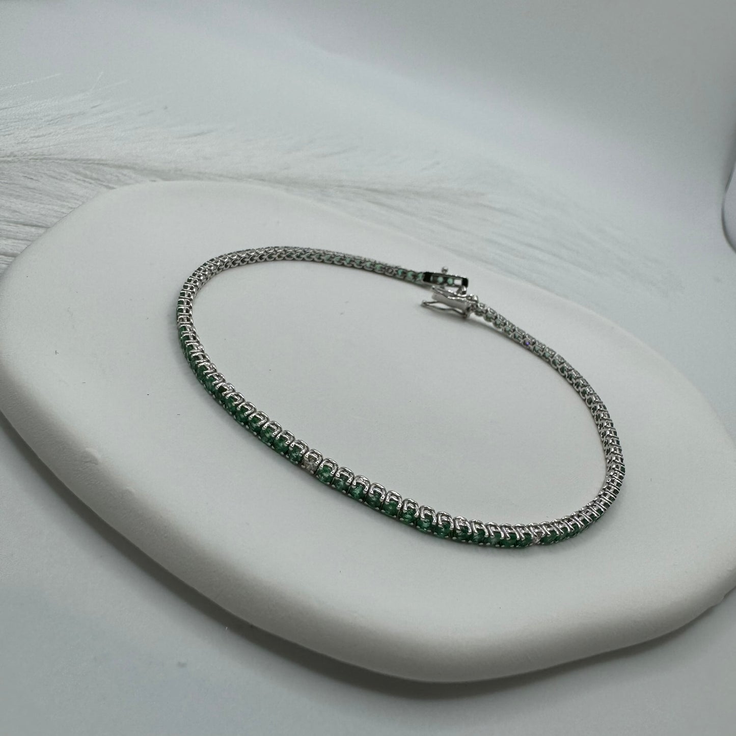 Bracciale tennis smeraldi e diamanti oro