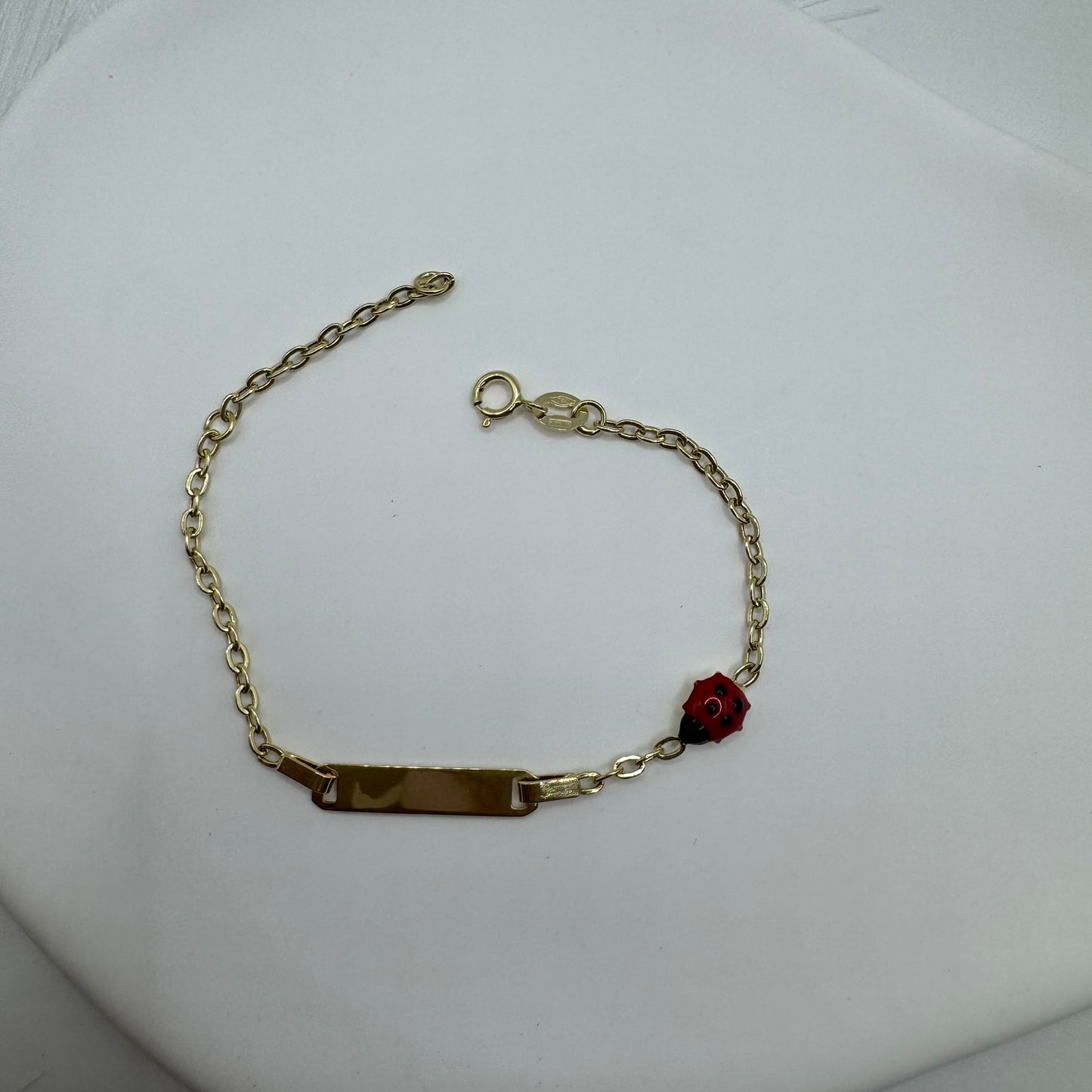 Bracciale piastra coccinella oro (bimbi)