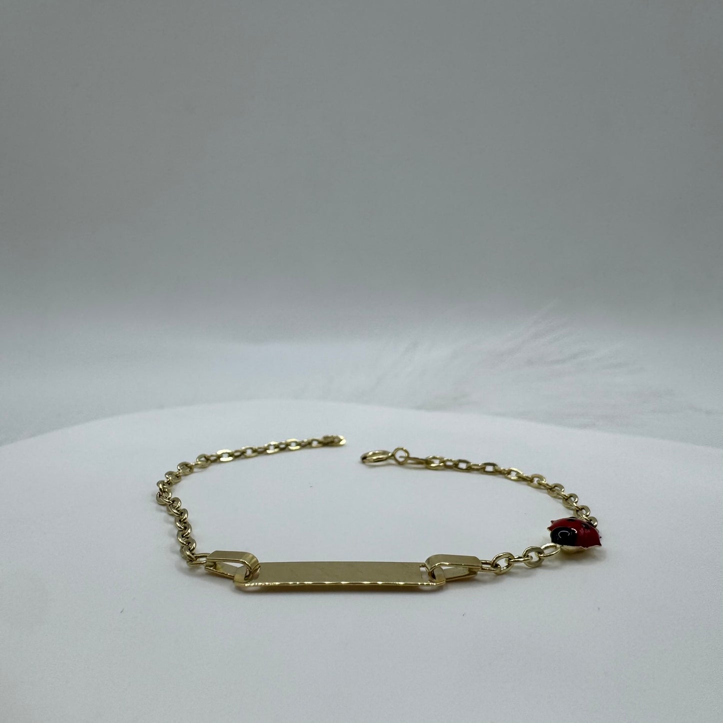 Bracciale piastra coccinella oro (bimbi)