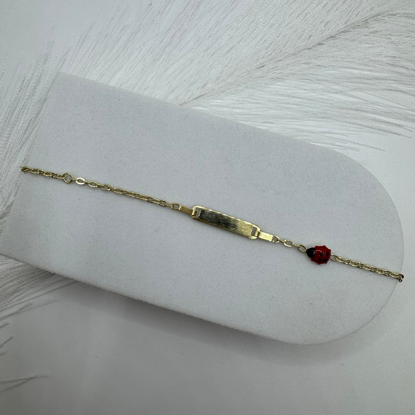 Bracciale piastra coccinella oro (bimbi)