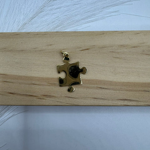 Pendente puzzle oro