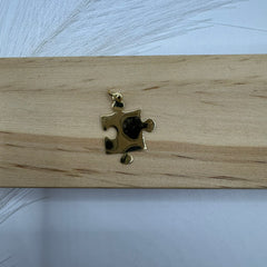 Pendente puzzle oro