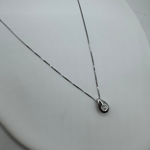 Collana con goccia punto luce oro e diamanti