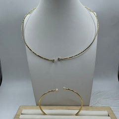 Parure tubolare rigido con zirconi oro