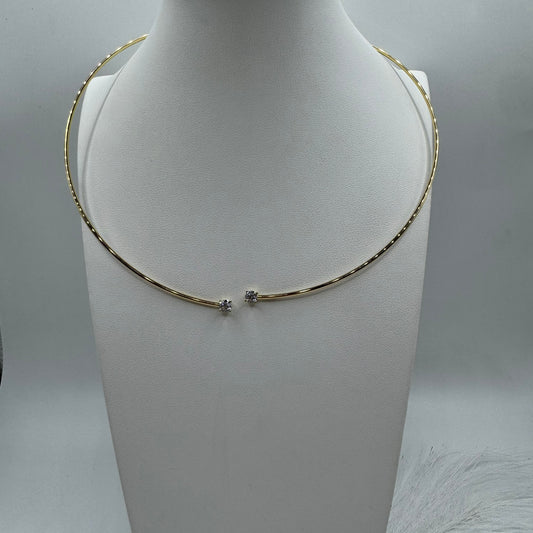Collana tubolare rigido con zirconi oro