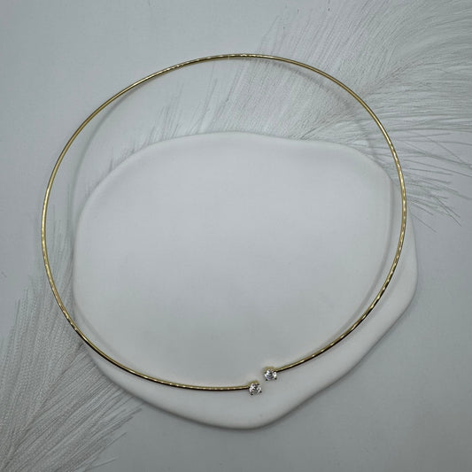 Collana tubolare rigido con zirconi oro