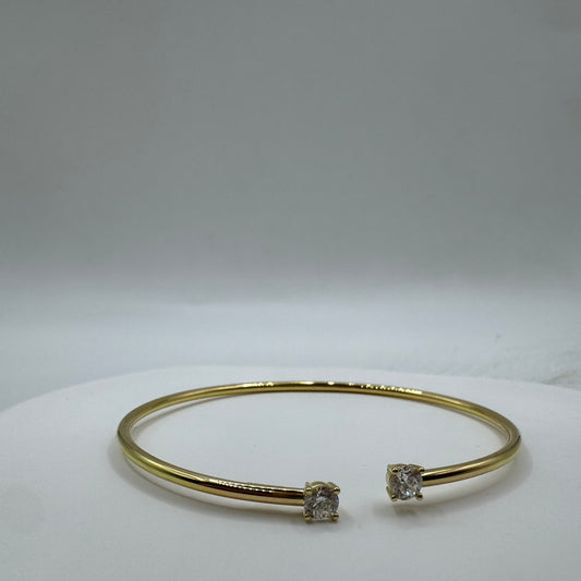 Bracciale tubolare rigido con zirconi oro