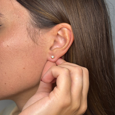 Orecchini punto luce oro e zirconi