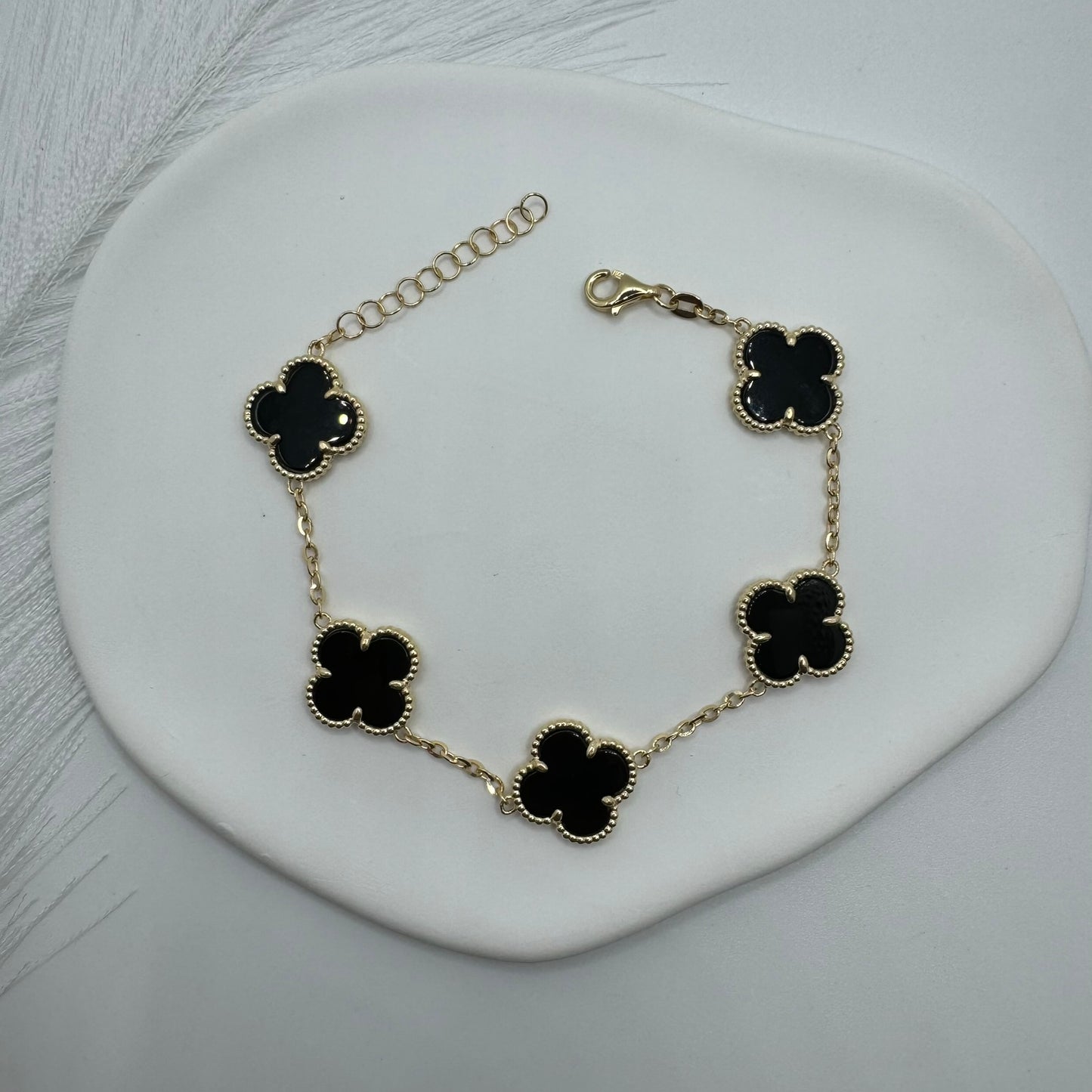 Bracciale 5 fiori nero oro