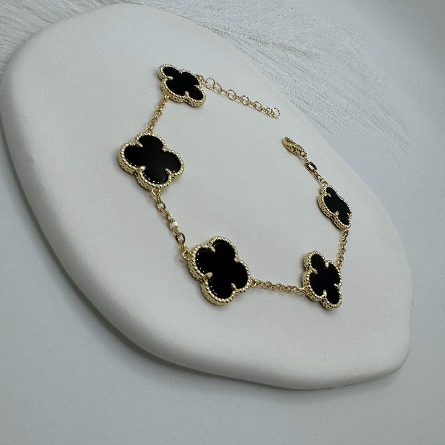 Bracciale 5 fiori nero oro