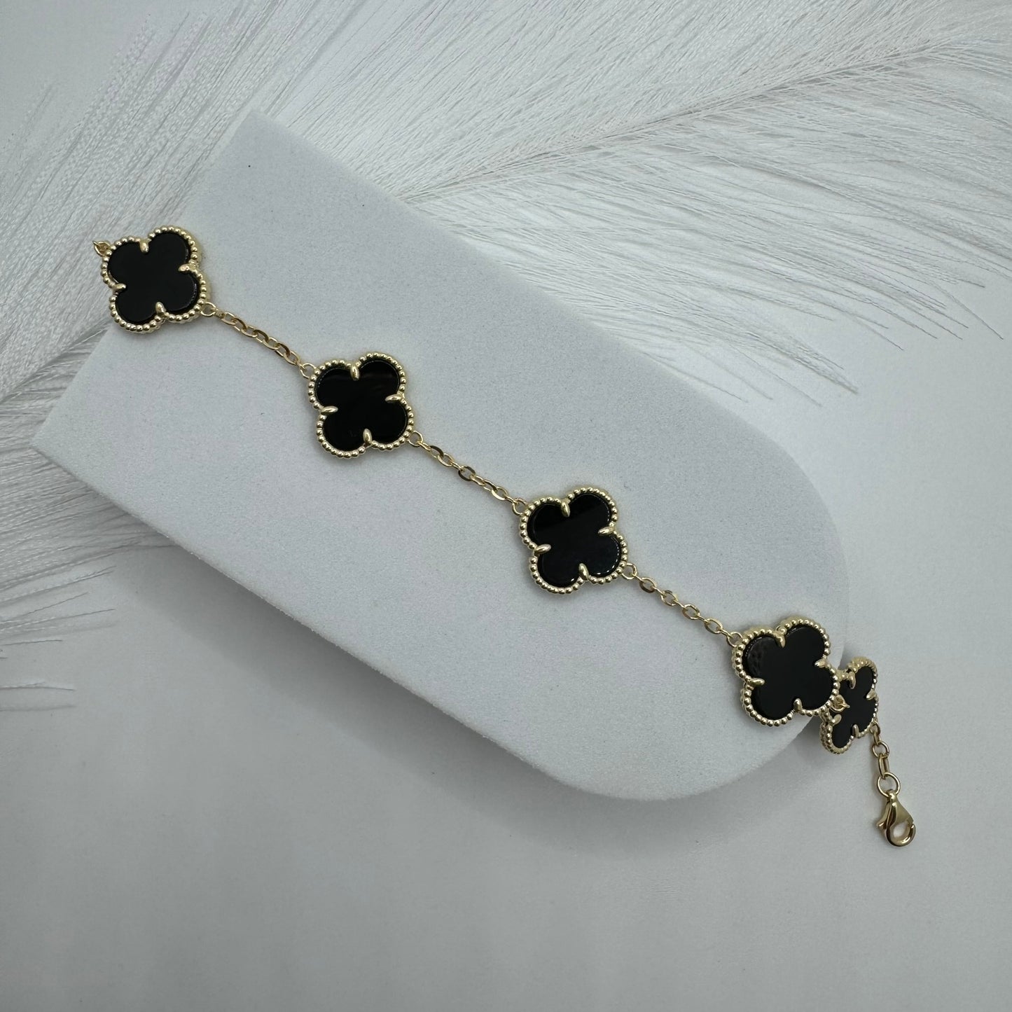 Bracciale 5 fiori nero oro