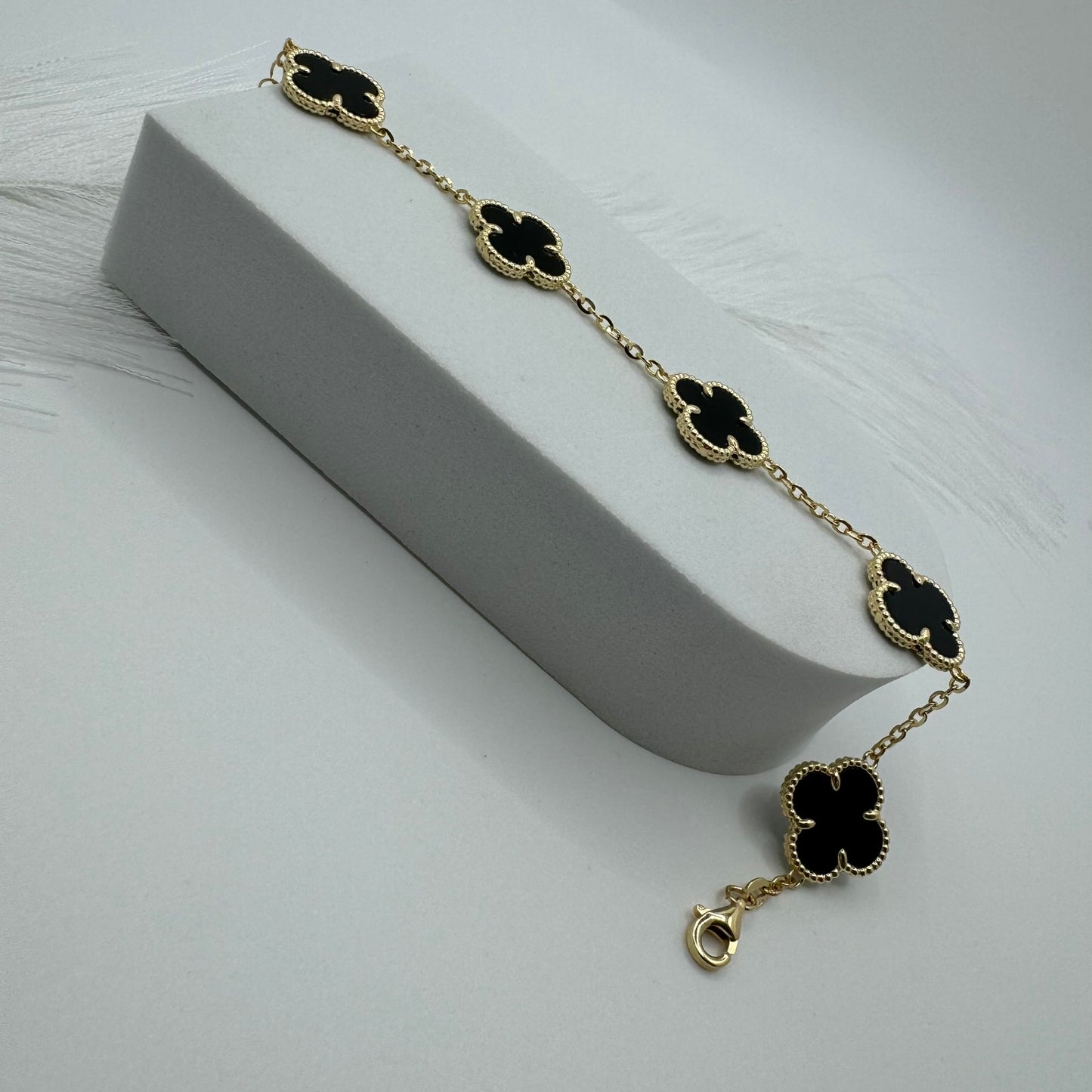 Bracciale 5 fiori nero oro