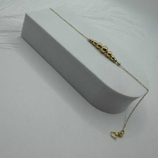 Bracciale rollò con sfere oro