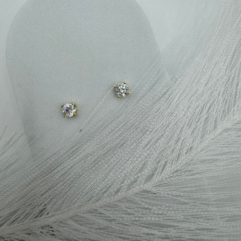 Orecchini punto luce oro e zirconi