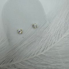 Orecchini punto luce oro e zirconi