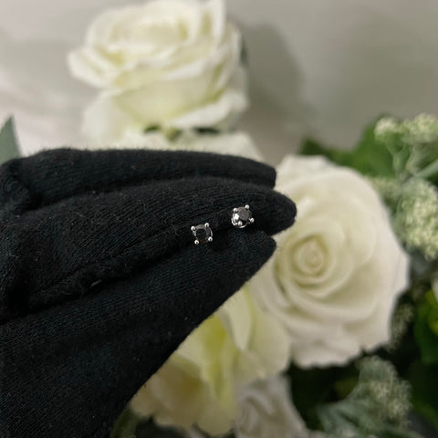 Orecchini punto luce oro e diamanti neri