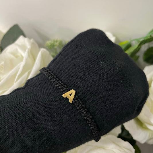 Bracciale lettera oro