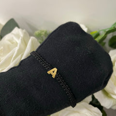 Bracciale lettera oro
